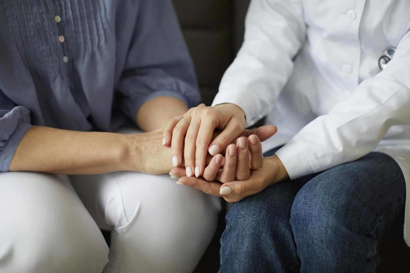 covid-recovery-center-female-doctor-holding-elder-patient-s-hands.jpg